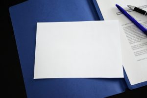 blank notepad for annotations with application portfolio background